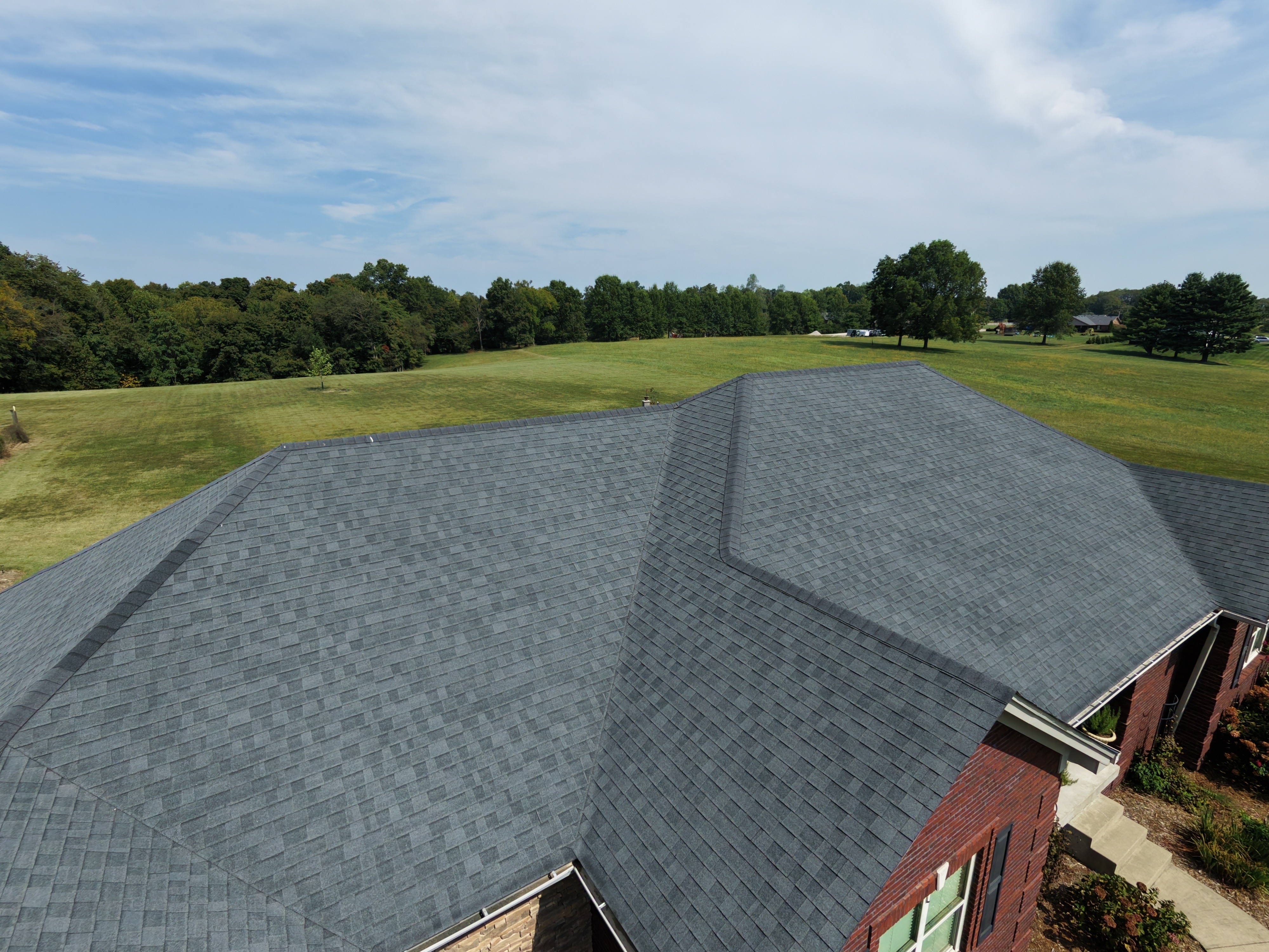 Close aerial view of a roof inspection.